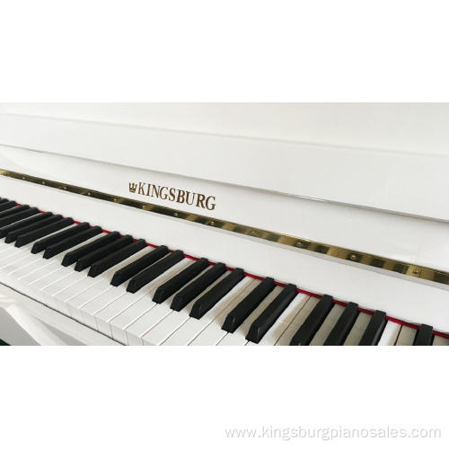 upright piano in front of window